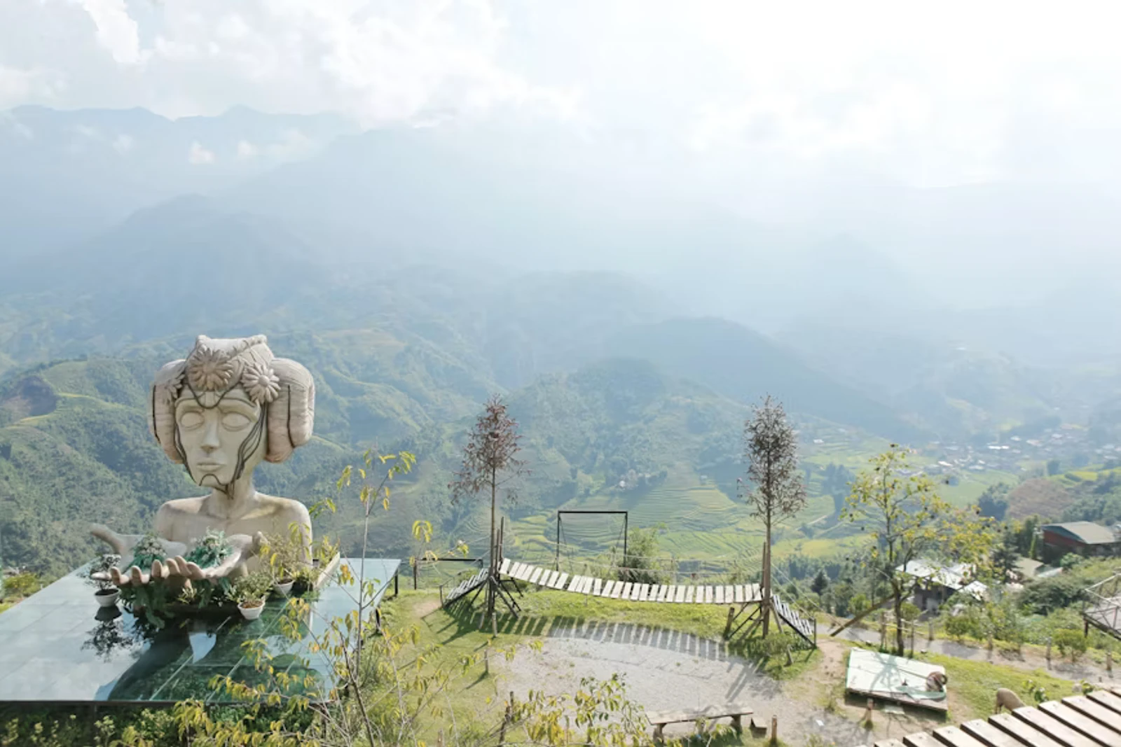 Terraced emerald rice paddies cascading down misty mountainsides in Sapa's Muong Hoa Valley, northern Vietnam